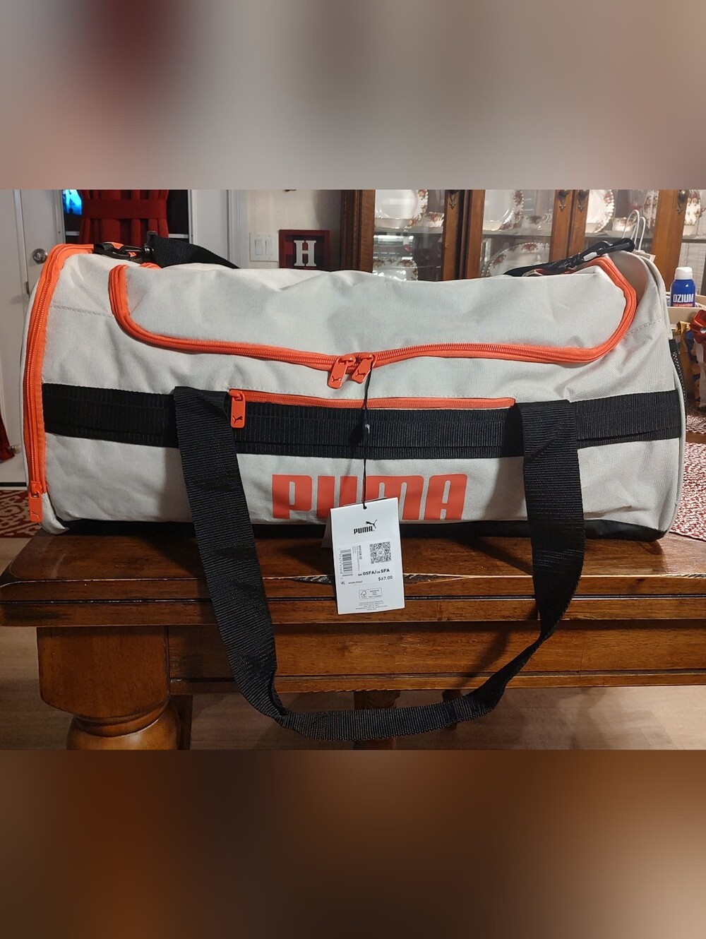 Puma Cream Duffel Bag with Pink Trim and Black Handles